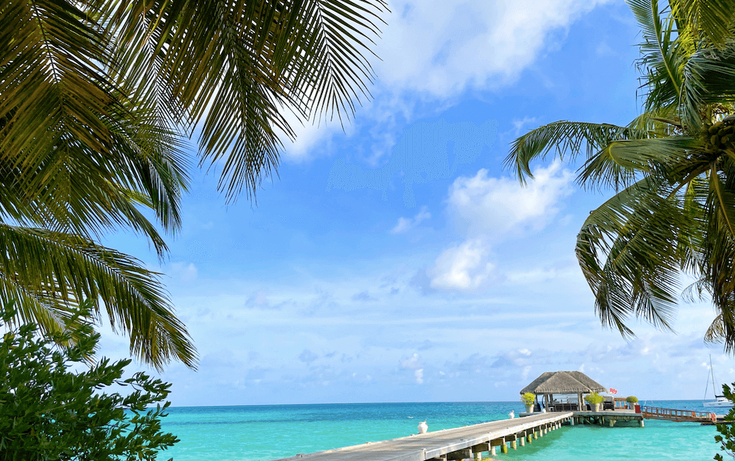 Disadvantages of Being a Digital Nomad - blue beach in the Maldives
